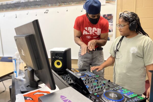 2022 Club member learns about DJ equipment, including different rhythms and beats, in a partnership with Bangtown Studio Productions and Recordings: Studio on the Go